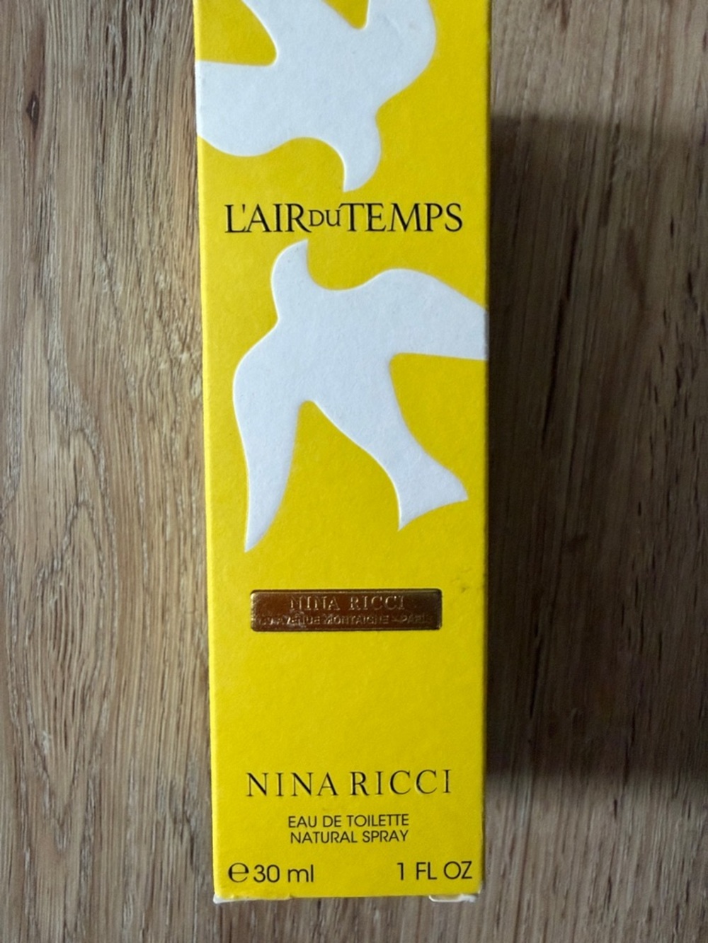 Nina Ricci L'Air du Temps Yellow Box with White Dove Motifs